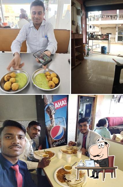 Take a look at the photo showing interior and food at DAS NASTA HOUSE