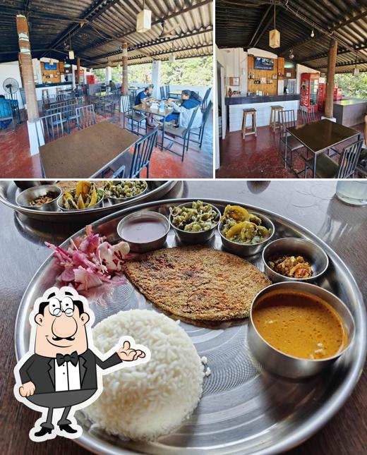 This is the photo displaying interior and food at Laxmi Bar & Restaurant