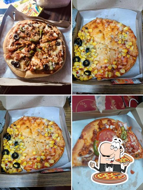 Get pizza at Girgit Resto Cafe