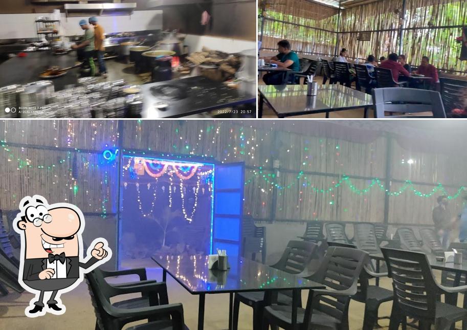 Take a seat at one of the tables at Samadhan Mutton Bhakri