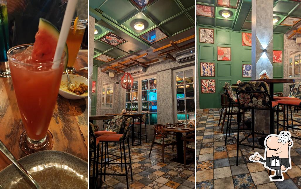 Take a seat at one of the tables at Taikun Bar and Kitchen