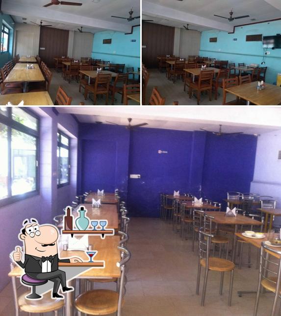 Take a seat at one of the tables at Minku Restaurant