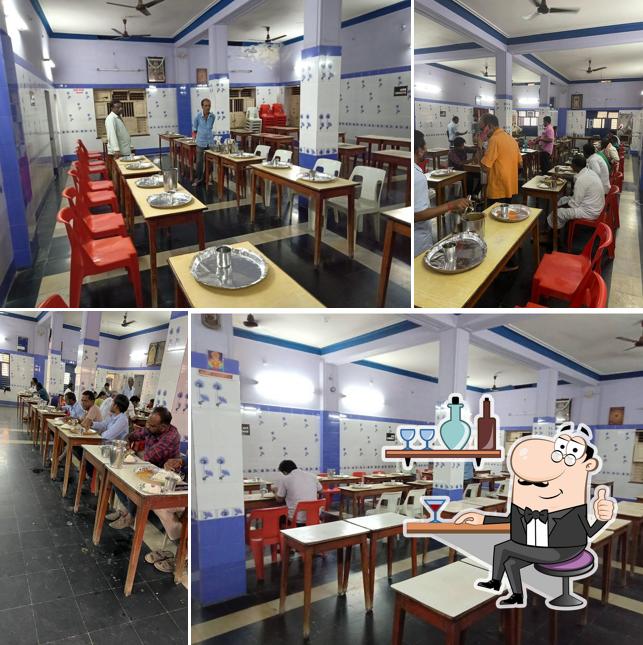 Take a seat at one of the tables at New Geetha Bhavan