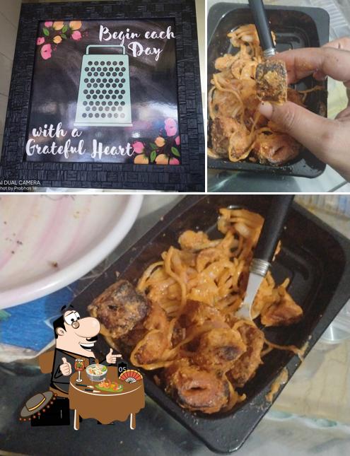 This is the image displaying food and blackboard at R K Food Plaza