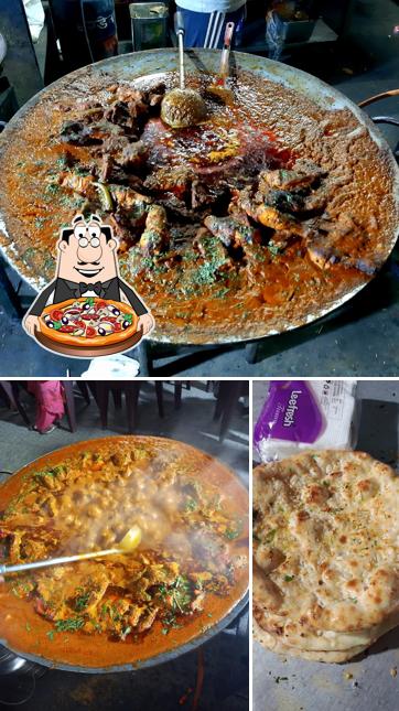 Get pizza at Aman's Fish 'n' Chick