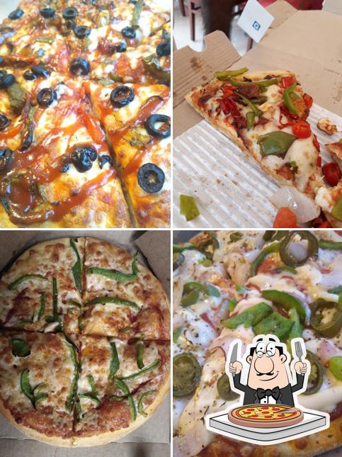 At Domino's Pizza Nana Varachha, Surat, you can order pizza