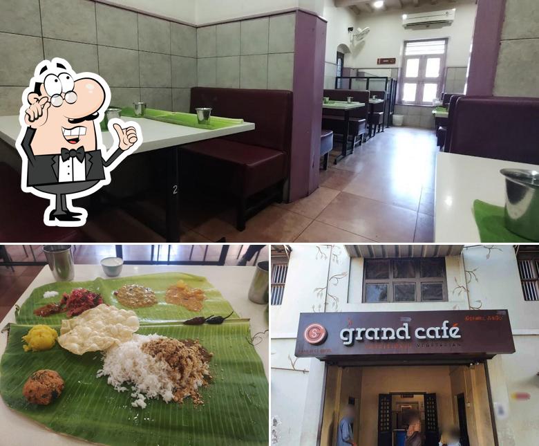 Take a seat at one of the tables at Grand Cafe