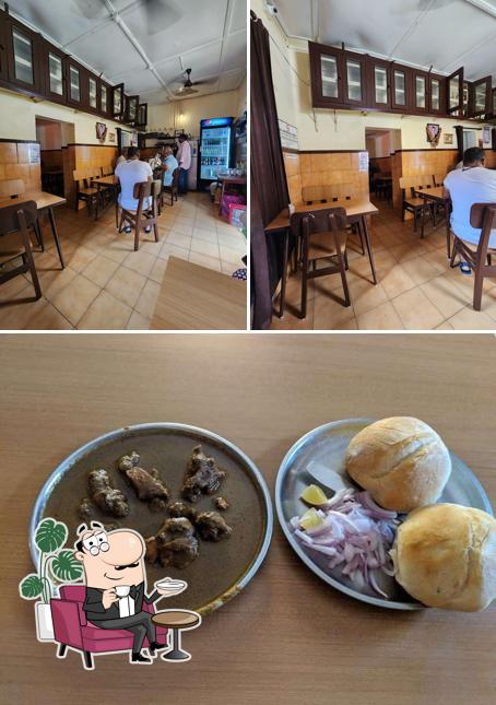The photo of interior and food at Ashok bar and restaurant since 1969(authentic xacuti place)