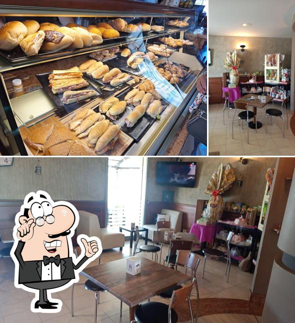 Siediti a un tavolo di Belice Snack Bar