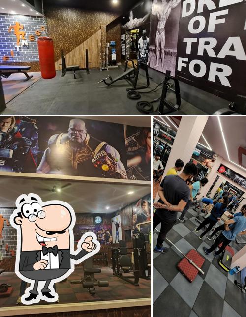 Among various things one can find interior and food at UNPLUGGEDx The Gym - The Biggest Gym Seoni