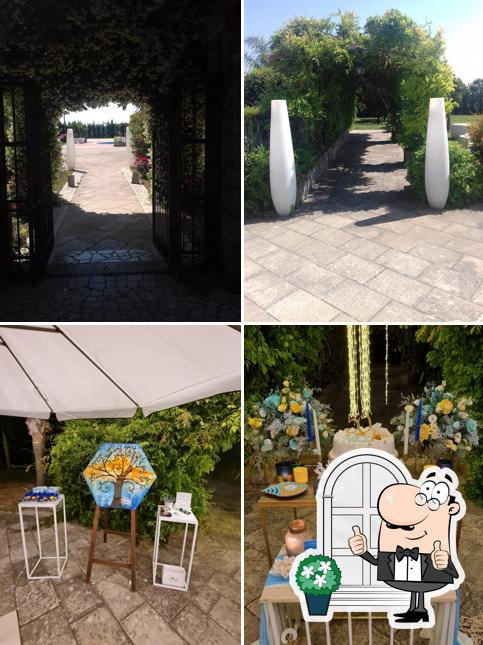 Puoi goderti l'aria fresca da seduto all'esterno di Tenuta Giardino Scozzi di Tenuta La Corte