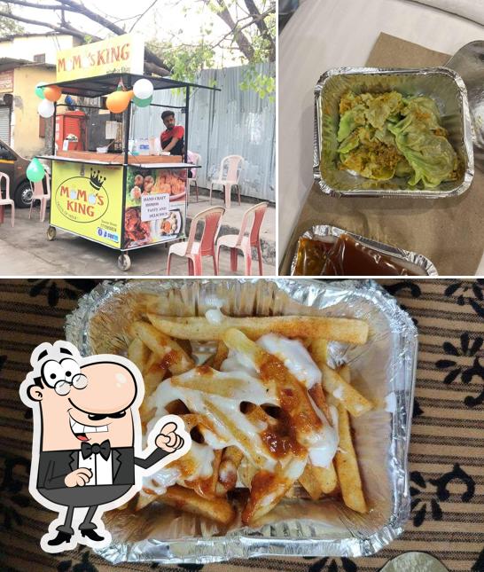 Among different things one can find interior and food at Momos King