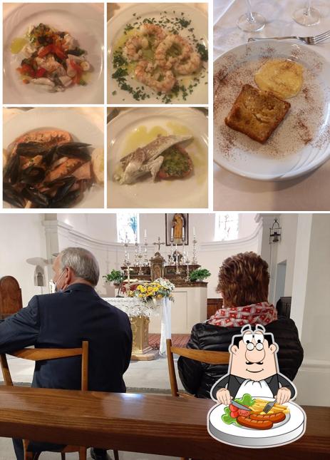 Trattoria Dancing Tiffany si caratterizza per la cibo e esterno