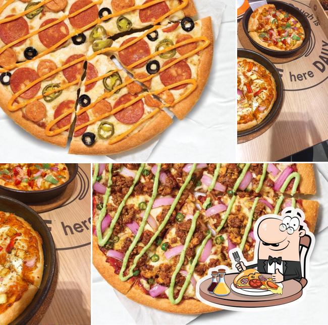 At Pizza Hut Piplod, Surat, you can taste pizza