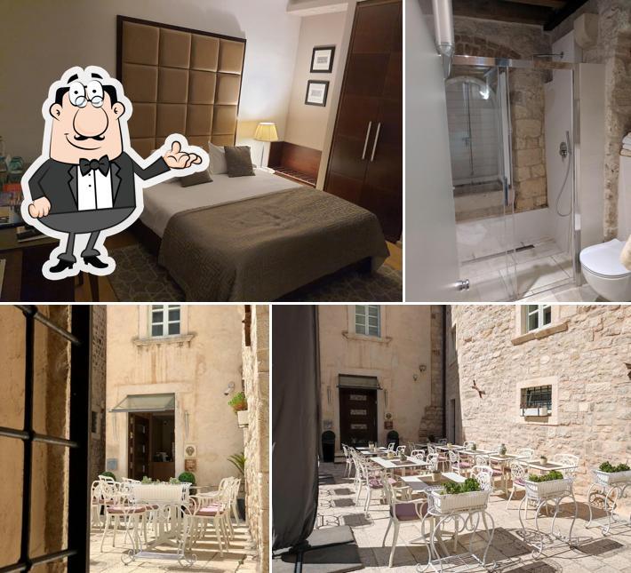 Siediti a un tavolo di Hotel Vestibul Palace