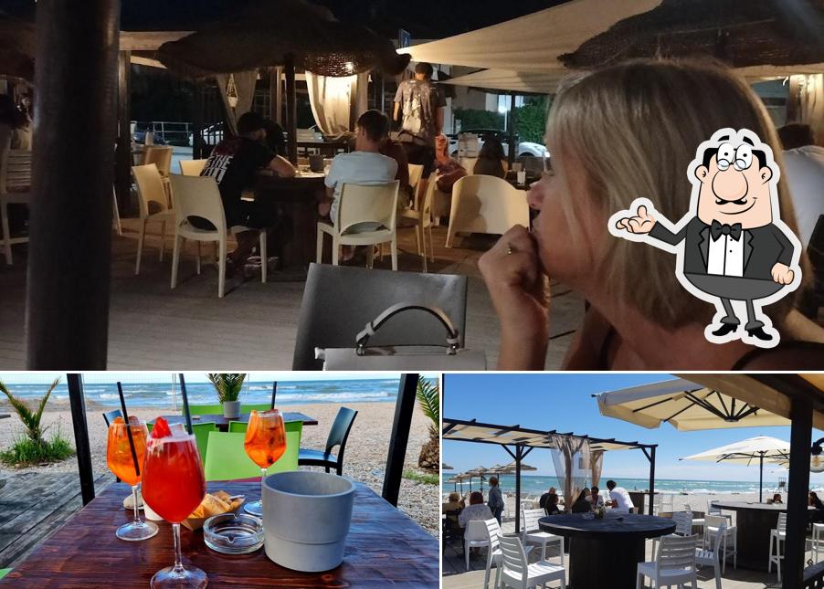 Questa è la immagine che raffigura la interni e cibo di Tritoni Beach
