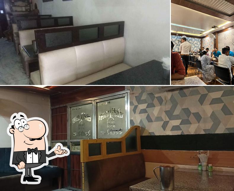Take a seat at one of the tables at Chotiwala Restaurant station bazariya