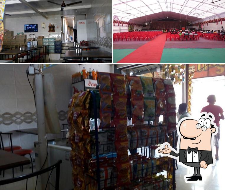 Take a seat at one of the tables at Gurukrupa Snacks Corner