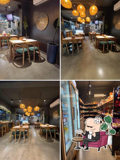 Take a seat at one of the tables at Hungry Owl Cafe & Confectionery