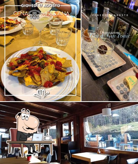 La immagine di interni e bevanda da Manera Country Pub