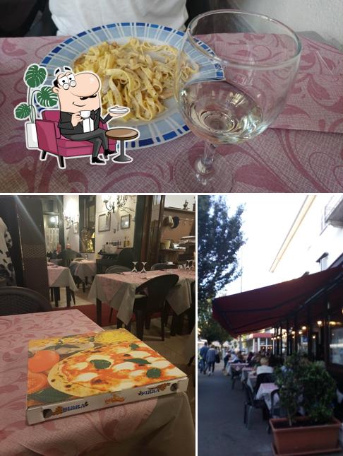 Guarda la immagine che presenta la interni e cibo di Antica Osteria Sibilla