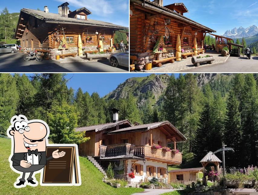 Puoi goderti l'aria fresca da seduto all'esterno di Rifugio Flora Alpina