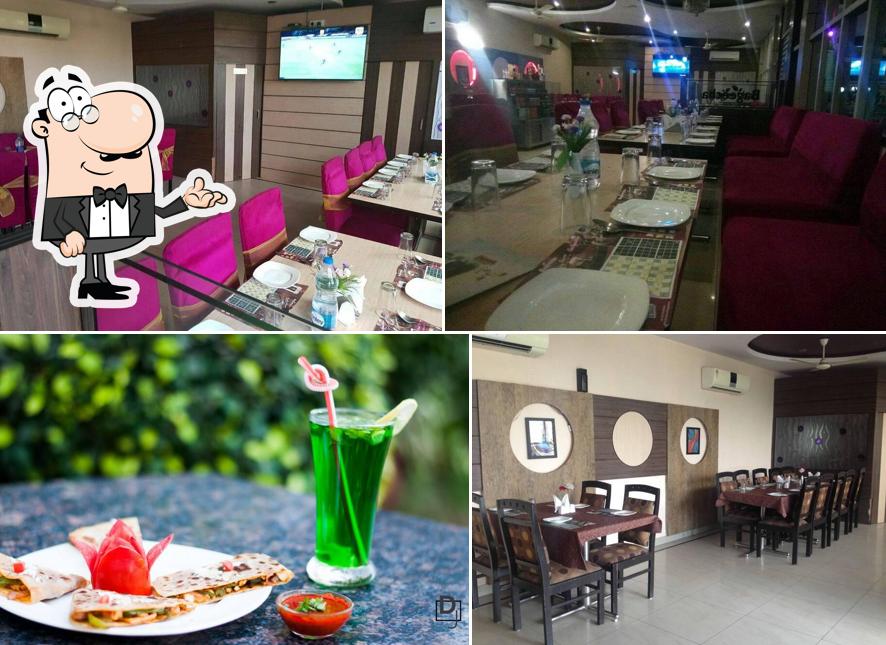 Take a seat at one of the tables at BAGEECHA Restaurant