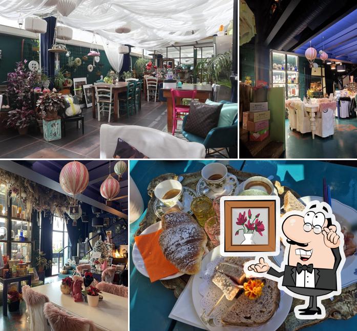 Siediti a un tavolo di Frangipane Garden Restaurant