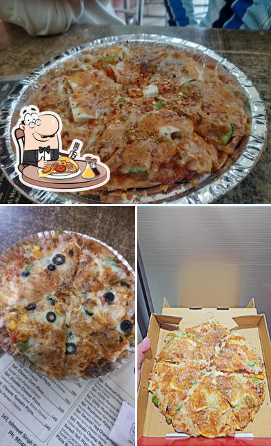 Get pizza at Suresh Pizza And Soya Chaap