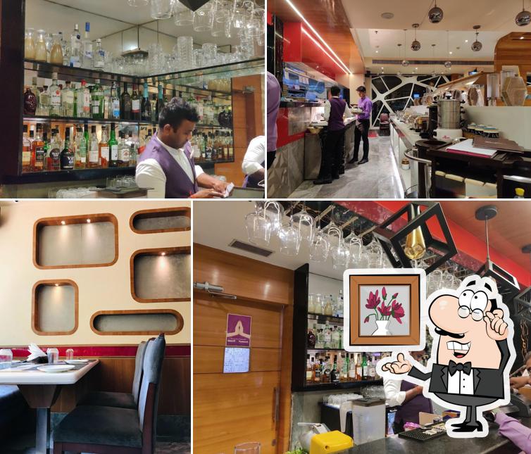 Take a seat at one of the tables at The Red Olive Take a seat at one of the tables at The Red Olive