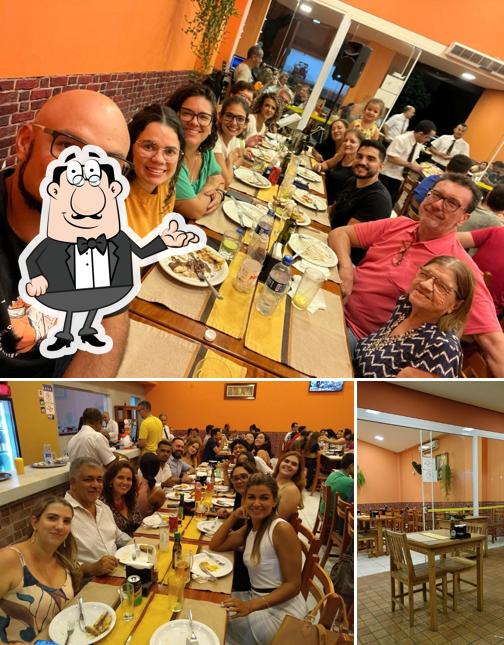 O interior do Fornaza Pizzaria e Choperia
