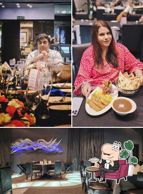 Take a seat at one of the tables at Frontier