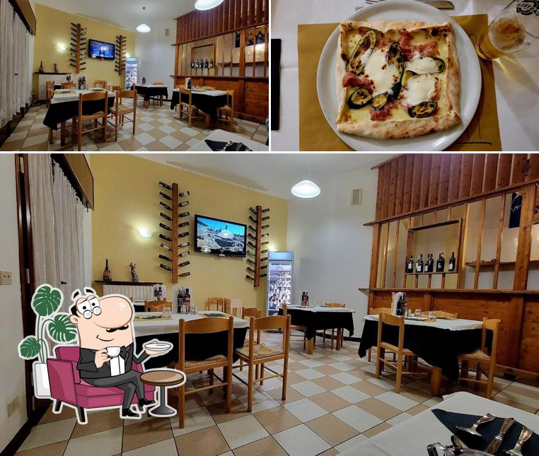 La immagine della interni e cibo di Pizzeria Ristorante K 19 Dali'