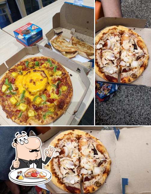 Try out pizza at Domino's Pizza