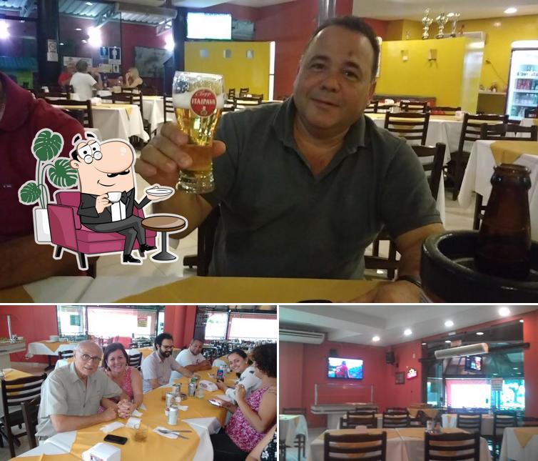 Sente em uma das mesas no Gauchopp