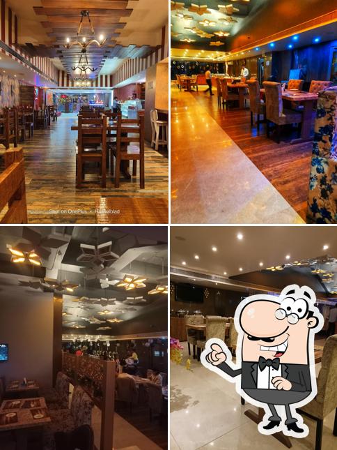 Take a seat at one of the tables at Food Mafia