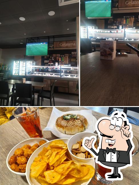 Questa è la foto che mostra la interni e cibo di Bar Spighe D'Oro