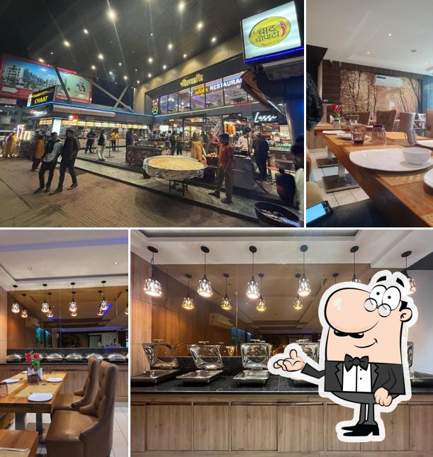 Take a seat at one of the tables at Namaste Restaurant - Opp. Prem Mandir, Vrindavan