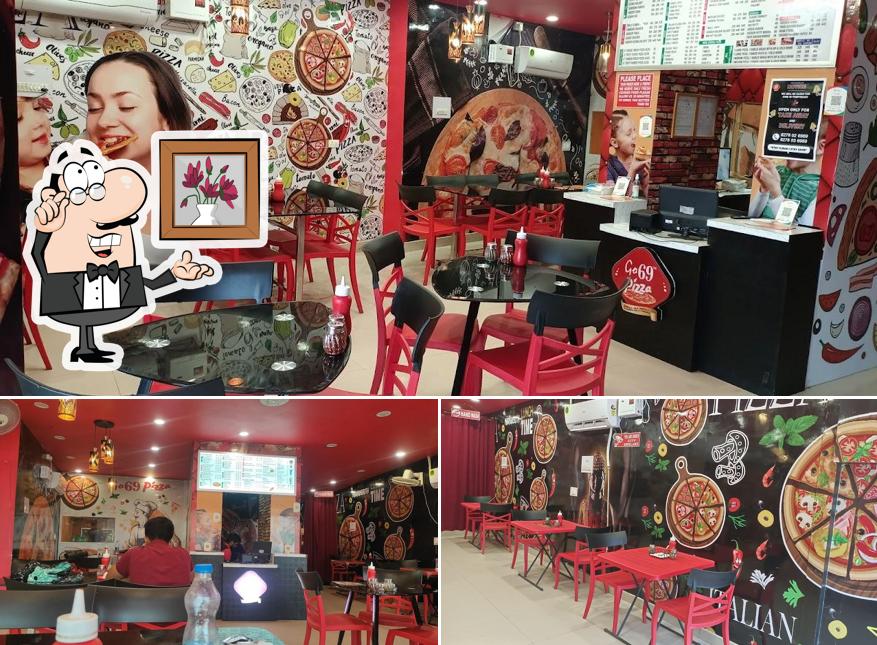 Take a seat at one of the tables at Go 69 Pizza