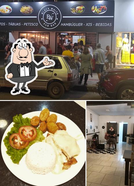 Entre diversos coisas, interior e exterior podem ser encontrados no Black White Pub Bar
