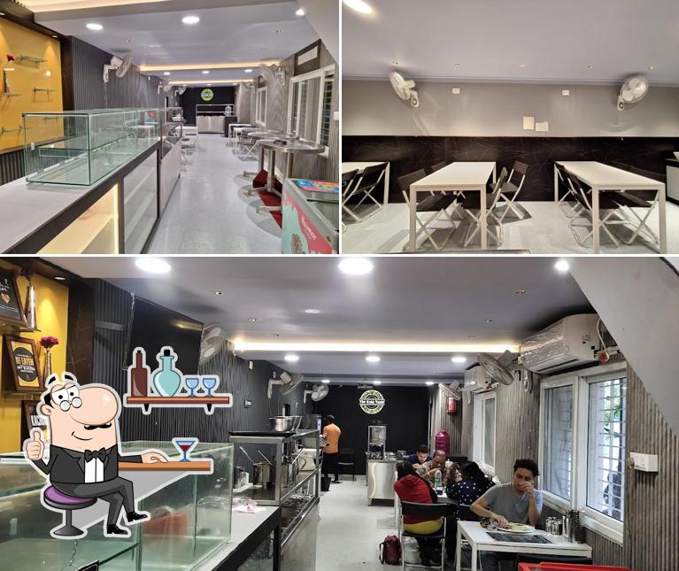 Take a seat at one of the tables at The Kota taste
