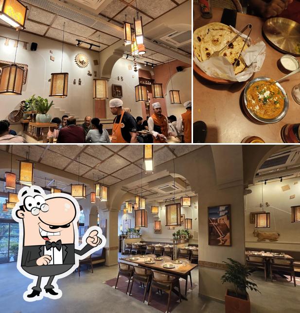 Take a seat at one of the tables at Jassi De Parathe