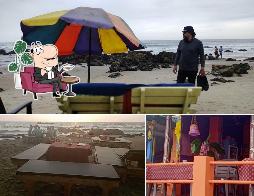 Take a seat at one of the tables at Lake view bar and restaurant