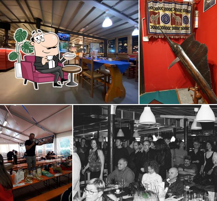 Siediti a un tavolo di Parco Verde Grill & Fry