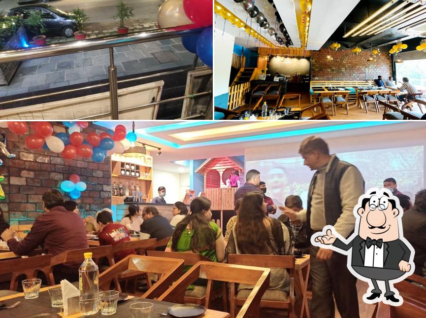Take a seat at one of the tables at Cocoon- Eat.Play.Celebrate