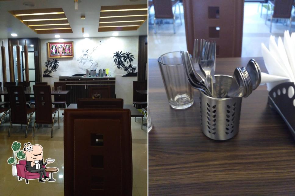 Take a seat at one of the tables at 22nd Parallel