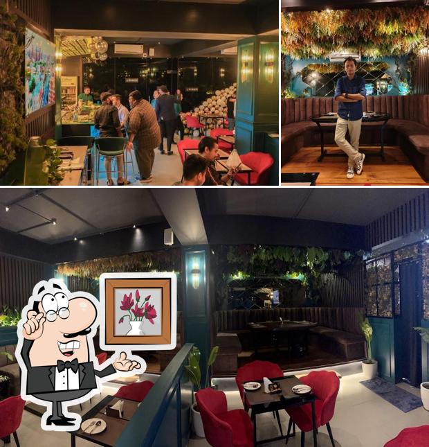 Take a seat at one of the tables at Top Notch Restro