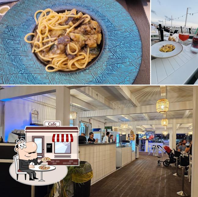 Dai un’occhiata alla immagine che mostra la esterno e cibo di Playa Natural Beach Bar Restaurant