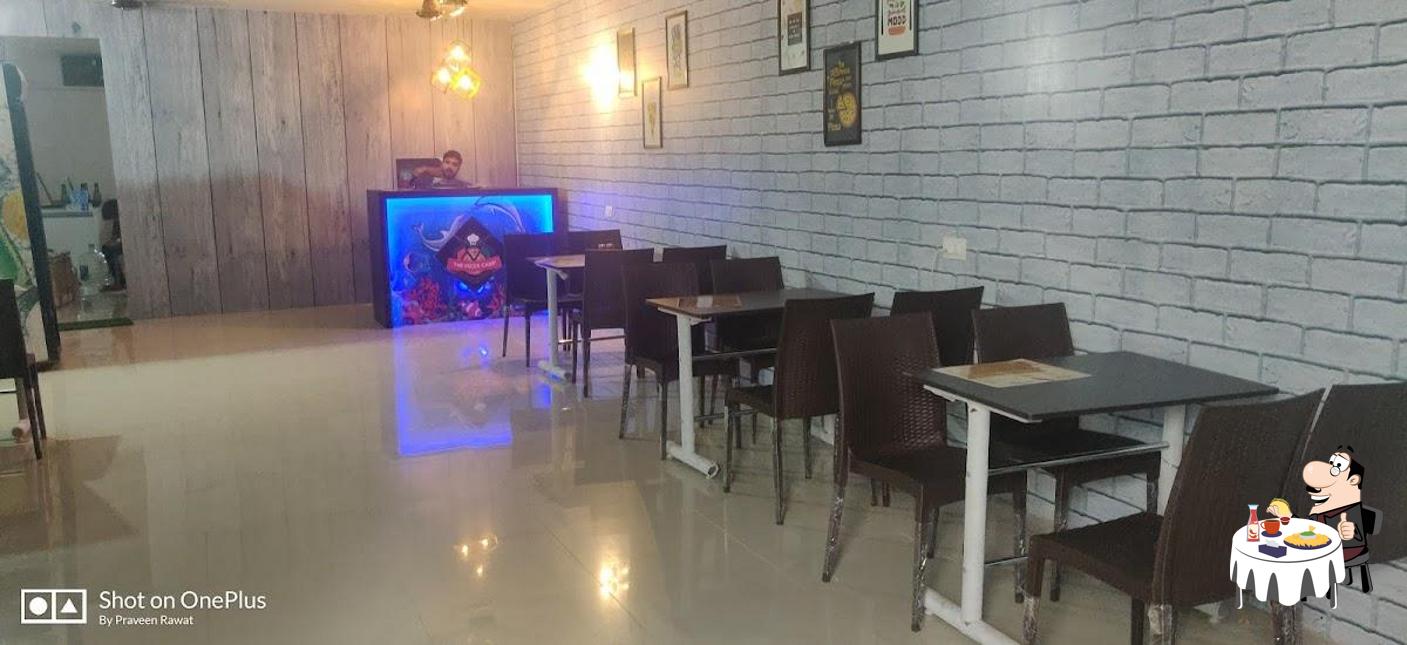 Order a burger at The pizza camp