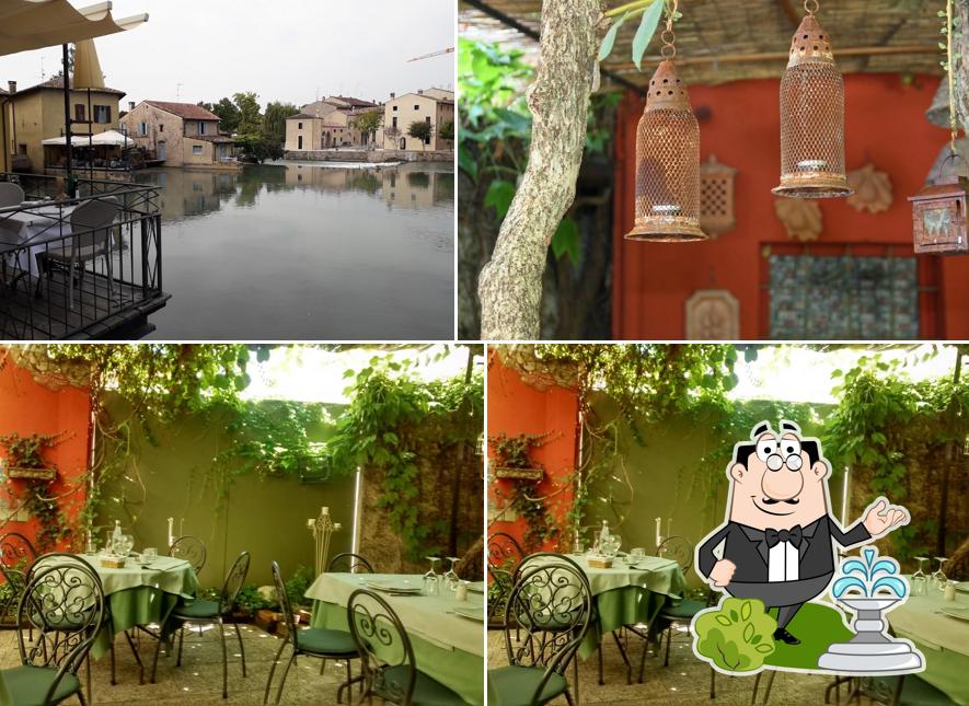 Guarda gli esterni di Trattoria Il Cavallino